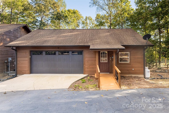 view of front of property featuring a garage