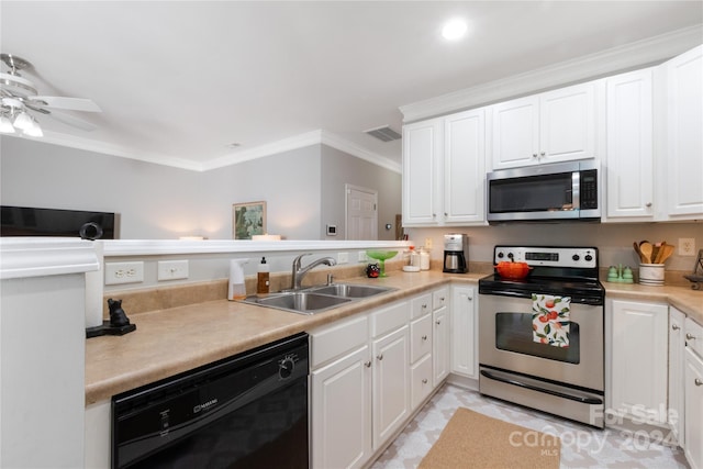 kitchen featuring appliances with stainless steel finishes, sink, and white cabinets