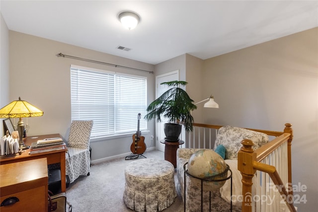 living area with carpet flooring