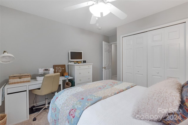 bedroom featuring light carpet, a closet, and ceiling fan