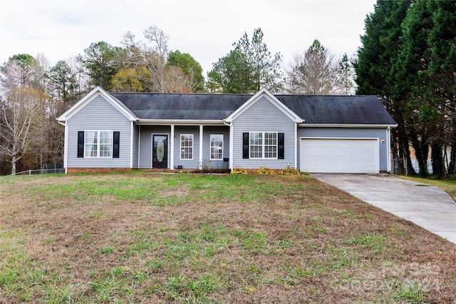 ranch-style house with a front yard and a garage