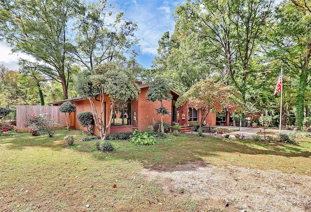 exterior space featuring a front lawn