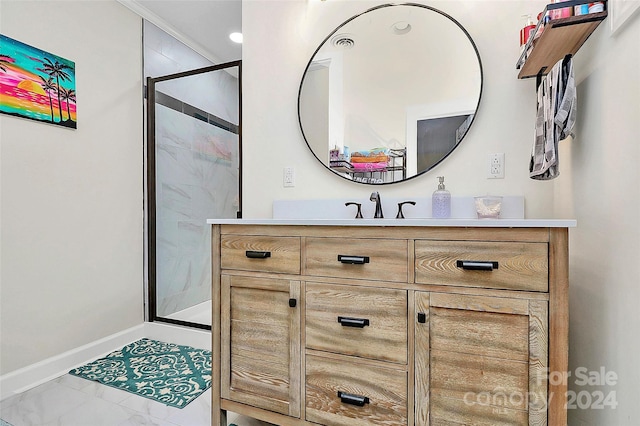 bathroom with a shower with door, vanity, and ornamental molding