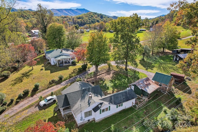 birds eye view of property featuring a mountain view