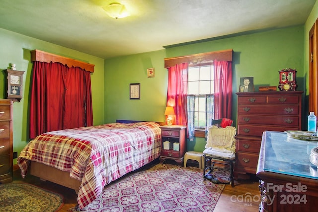 bedroom featuring wood-type flooring