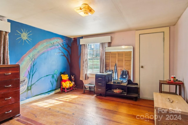 interior space with hardwood / wood-style floors