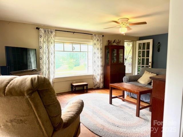 396 Will Hyatt Rd, Waynesville, NC 28786 - living area featuring a ceiling fan