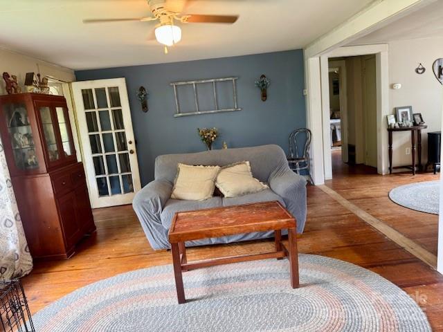 396 Will Hyatt Rd, Waynesville, NC 28786 - living room featuring light wood-style floors and a ceiling fan