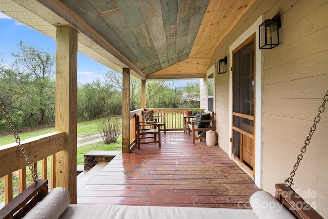 deck featuring covered porch