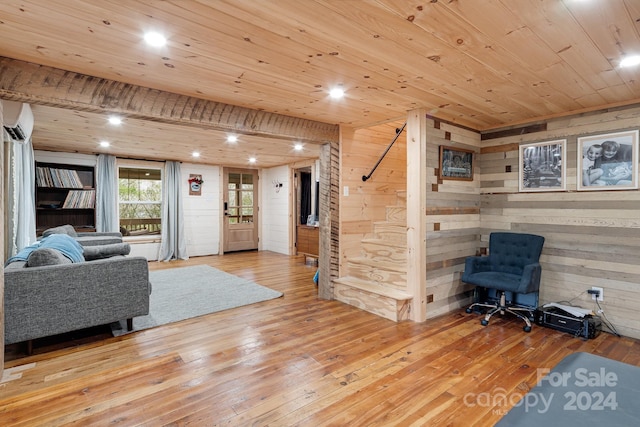 living room featuring wood-type flooring, wood ceiling, and a wall mounted air conditioner