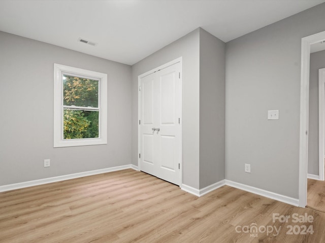 unfurnished bedroom featuring light hardwood / wood-style flooring