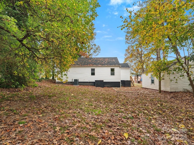 view of property exterior featuring central AC