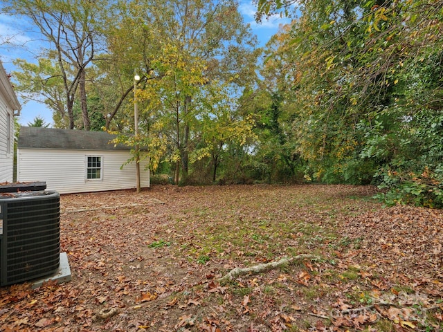 view of yard featuring central AC unit