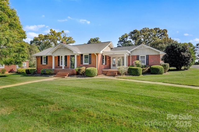 ranch-style house with brick siding and a front lawn