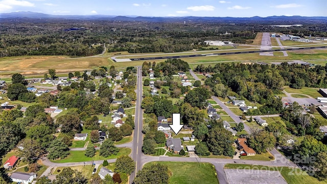 bird's eye view featuring a residential view and a mountain view