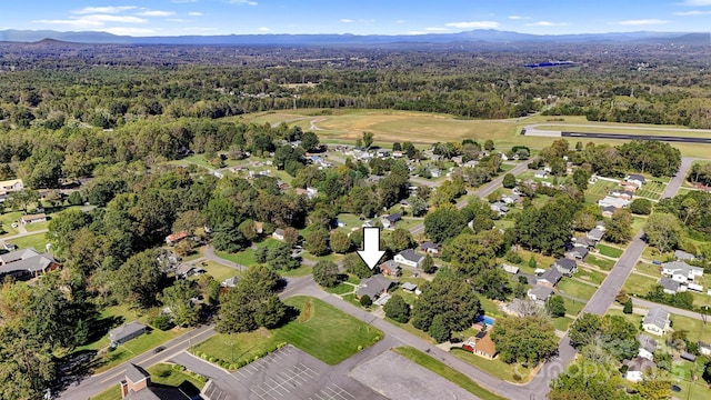 birds eye view of property with a residential view and a mountain view