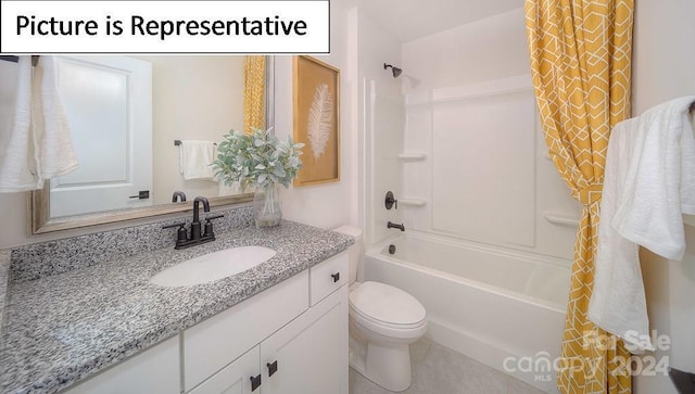 full bath with shower / tub combo with curtain, vanity, and toilet
