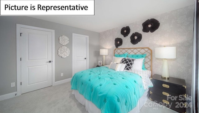 carpeted bedroom with baseboards and wallpapered walls