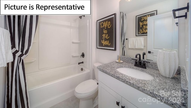 bathroom featuring shower / bath combo with shower curtain, vanity, and toilet