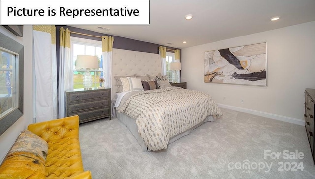 carpeted bedroom featuring recessed lighting and baseboards
