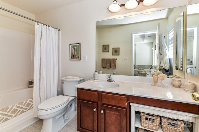 full bathroom featuring tile patterned flooring, vanity, shower / tub combo, and toilet