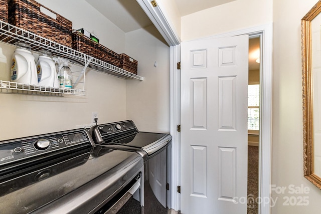 laundry room featuring washer and dryer