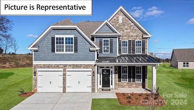 craftsman inspired home featuring an attached garage, concrete driveway, a front yard, and stone siding