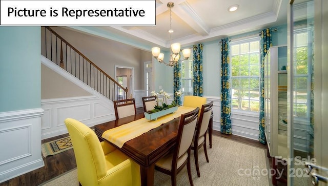 dining space with a notable chandelier, crown molding, beamed ceiling, coffered ceiling, and a decorative wall