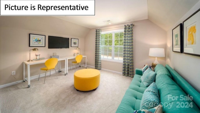 carpeted living area with baseboards and vaulted ceiling