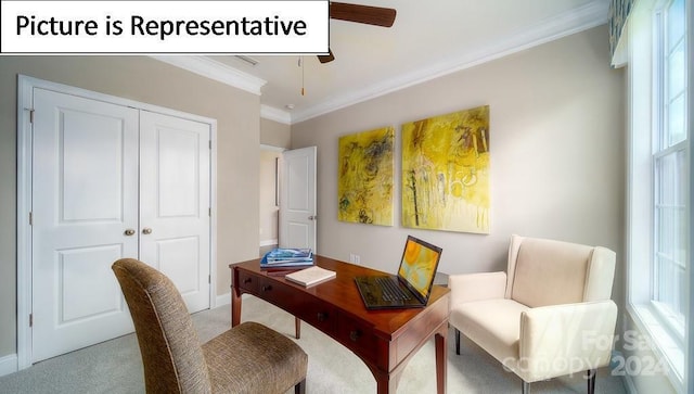 carpeted home office featuring crown molding, baseboards, and a ceiling fan