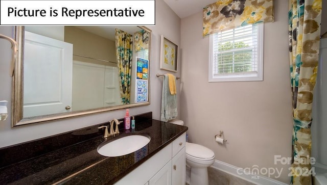 full bathroom with vanity, a shower with curtain, and toilet