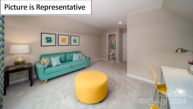 carpeted living room with baseboards and lofted ceiling