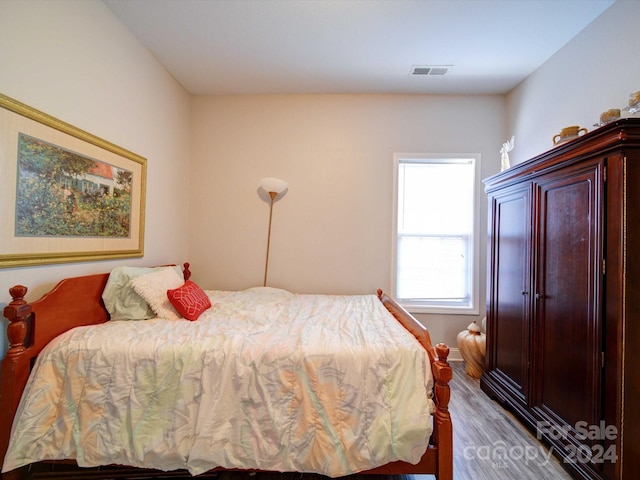 bedroom featuring light hardwood / wood-style floors