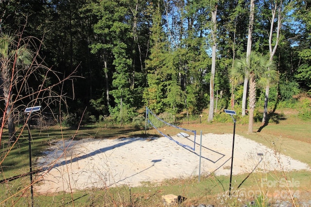 view of community featuring volleyball court