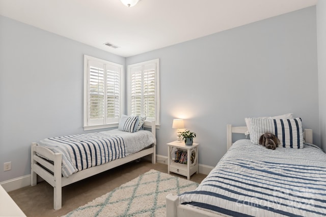 bedroom featuring carpet