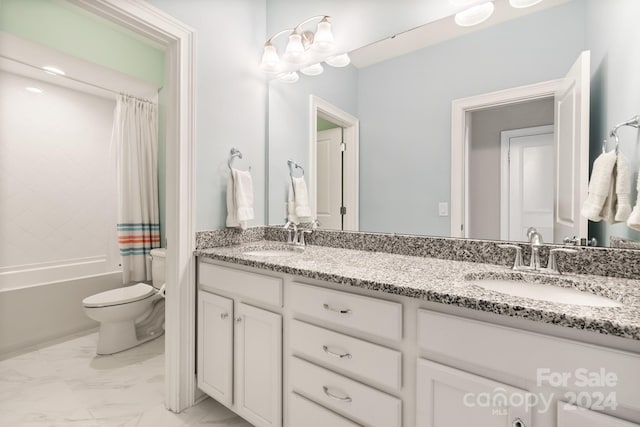 full bathroom featuring vanity, shower / tub combo with curtain, and toilet