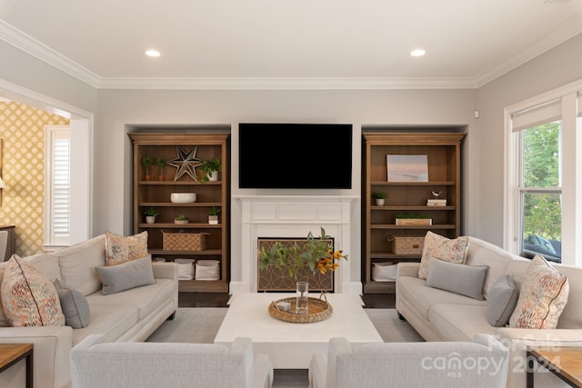 living room featuring ornamental molding and light hardwood / wood-style flooring