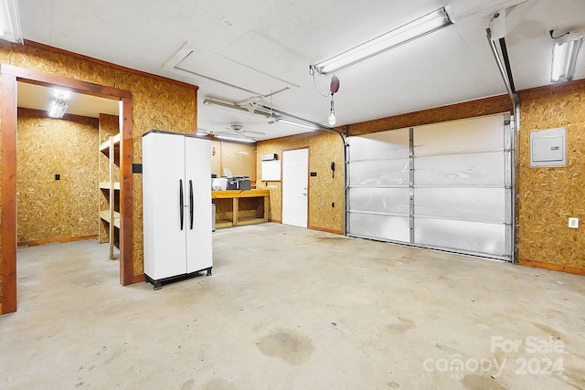 garage with white fridge