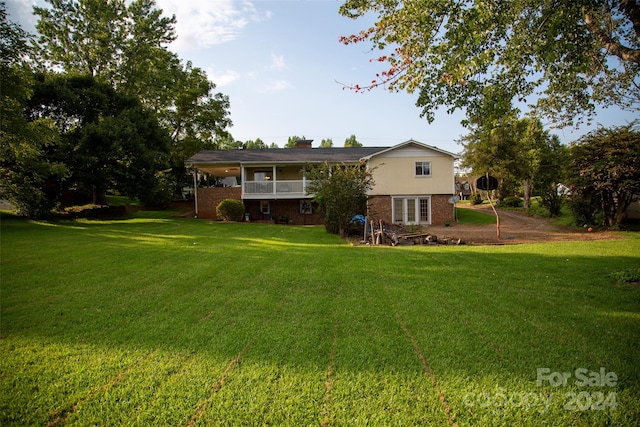 exterior space featuring a yard