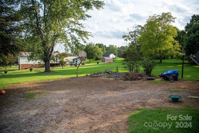 view of community featuring a yard