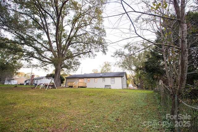 view of yard with a deck