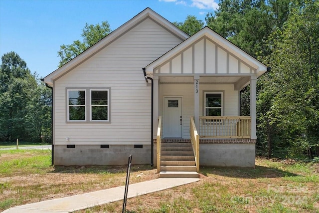 view of front of home featuring covered porch