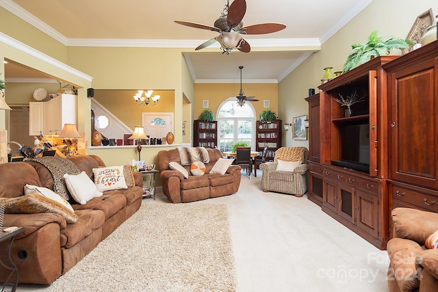 living room featuring ornamental molding, ceiling fan with notable chandelier, and carpet floors