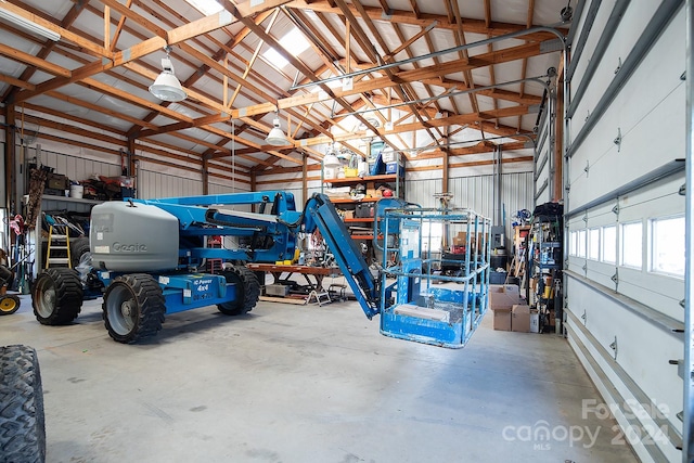 garage with a workshop area