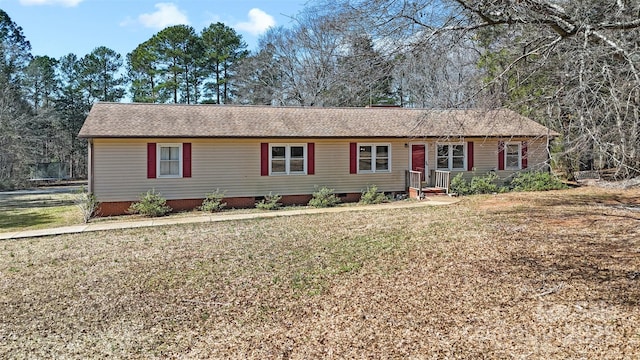 single story home with crawl space and a front lawn