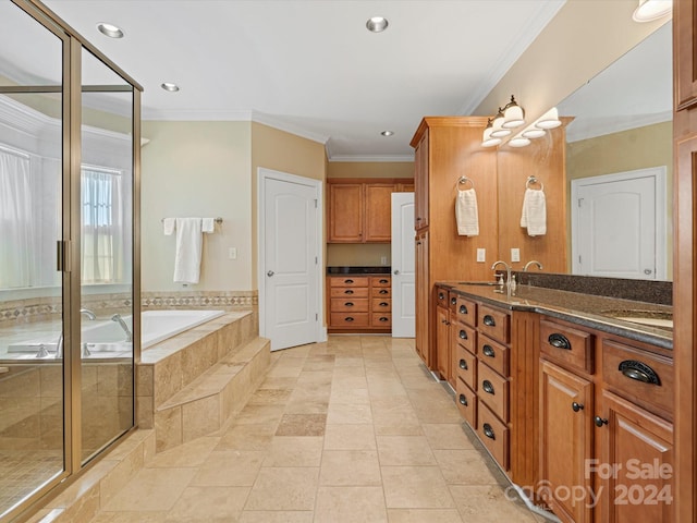 bathroom with vanity, crown molding, shower with separate bathtub, and tile patterned flooring