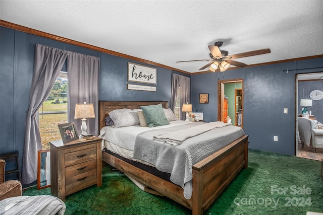 bedroom with ceiling fan, a textured ceiling, ornamental molding, and dark colored carpet