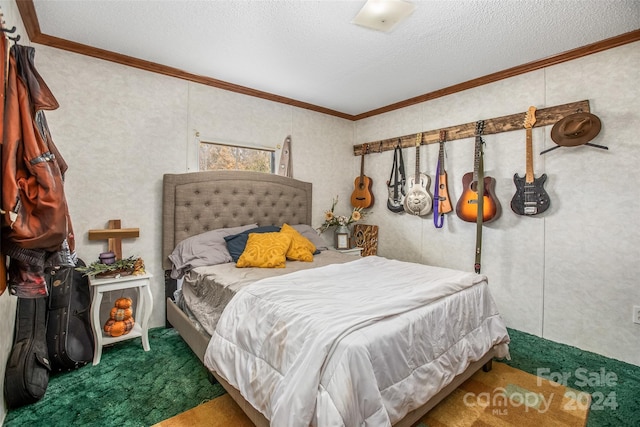 carpeted bedroom featuring crown molding and a textured ceiling