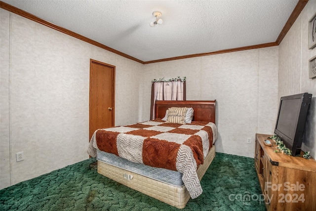 bedroom with ornamental molding, a textured ceiling, and dark colored carpet