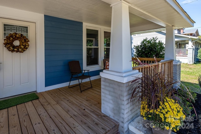 wooden terrace with covered porch